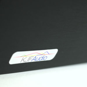and ultra close up of the KJF audio logo badge